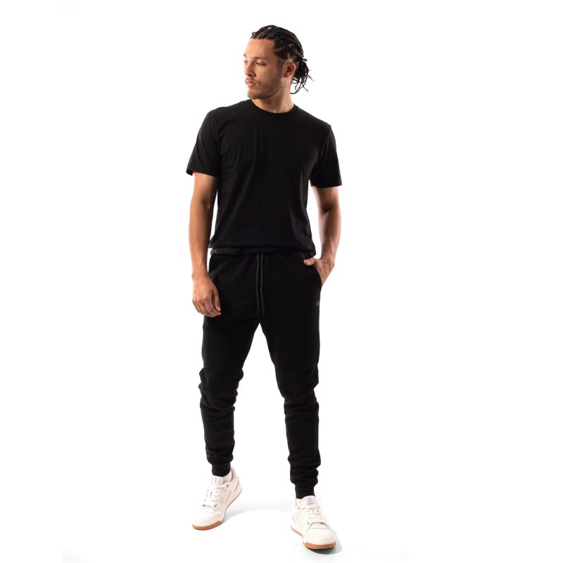 RMB1018 BLK Russell 20Athletic 20Typhoon 20Mens 20Trackpants on 20model 20walking web